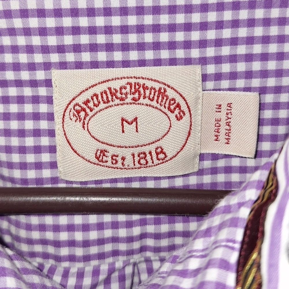 A Brooks Brothers purple plaid long sleeve button-down shirt in a men's medium. - Picture 2 of 7